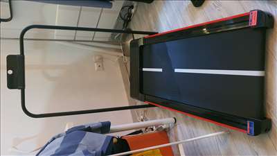 Voici un exemple d'un tapis de course à pied à réparer